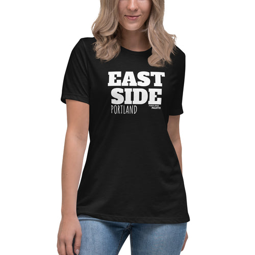 Person wearing a black t-shirt with 'EAST SIDE PORTLAND' design on a white background